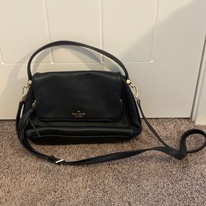 Small black Kate Spade purse. Never been used.
